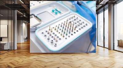 Set of professional instruments in dentist's office. Complete modern set of dentist`s drills. Wall mural